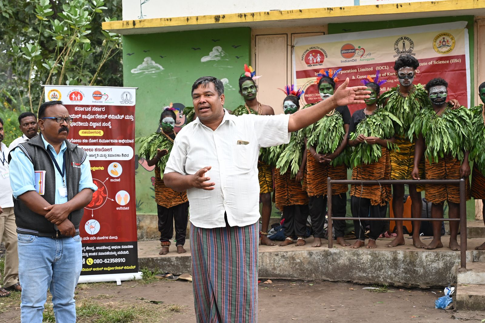 A field team facilitating a community health awareness activity